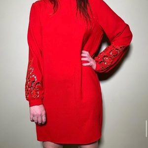 Red dress with lace sleeve accent